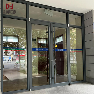 Heavy Duty Commercial Aluminum Entrance Door KFC Style Windproof Double Glazed Shopfront Door With High Thermal Insulation